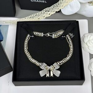 Elegant Two-Tone Bow Necklace